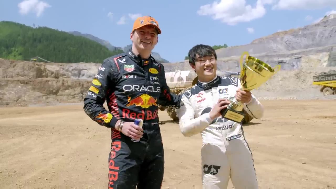 F1 Drivers Race HUGE Mega Trucks! (Max Verstappen vs Yuki Tsunoda)