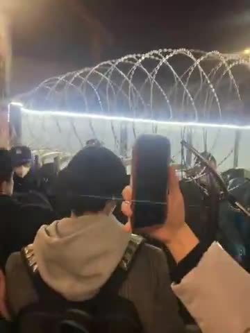 CHINESE STUDENTS PROTEST AGAINST QUARANTINE AT GUANGZHOU AIRPORT
