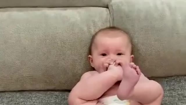 Baby Sucks Their Toes Imitating Dog Who Was Licking Their Paw