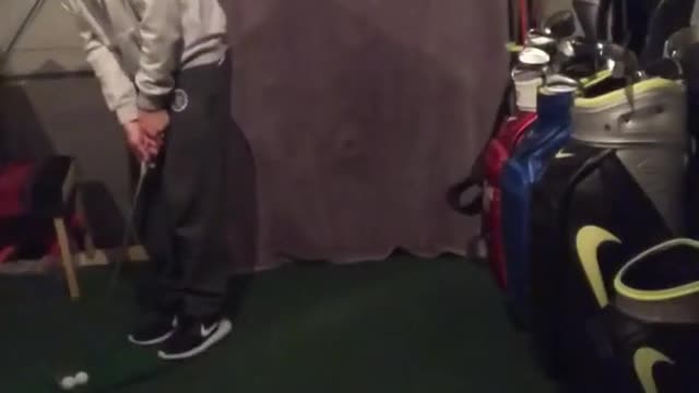 Man Lands Two Golf Balls In Separate Glasses in Trick Shot