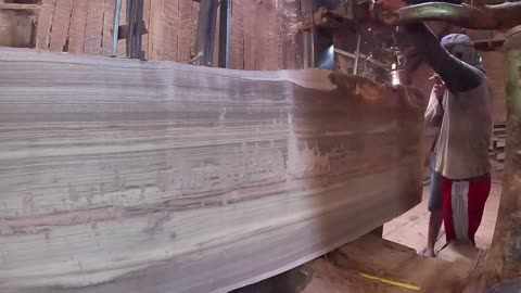 very extreme process!!! a view of close up sawing giant log