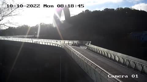 The moment the rocket hit the pedestrian bridge near the Arch of Friendship of Peoples