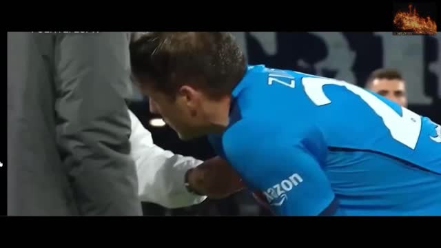 Napoli footballer Piotr Zelinski leaves the field tonight holding his chest