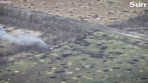 Russian soldiers flee as Ukrainian forces obliterate row of armoured vehicles