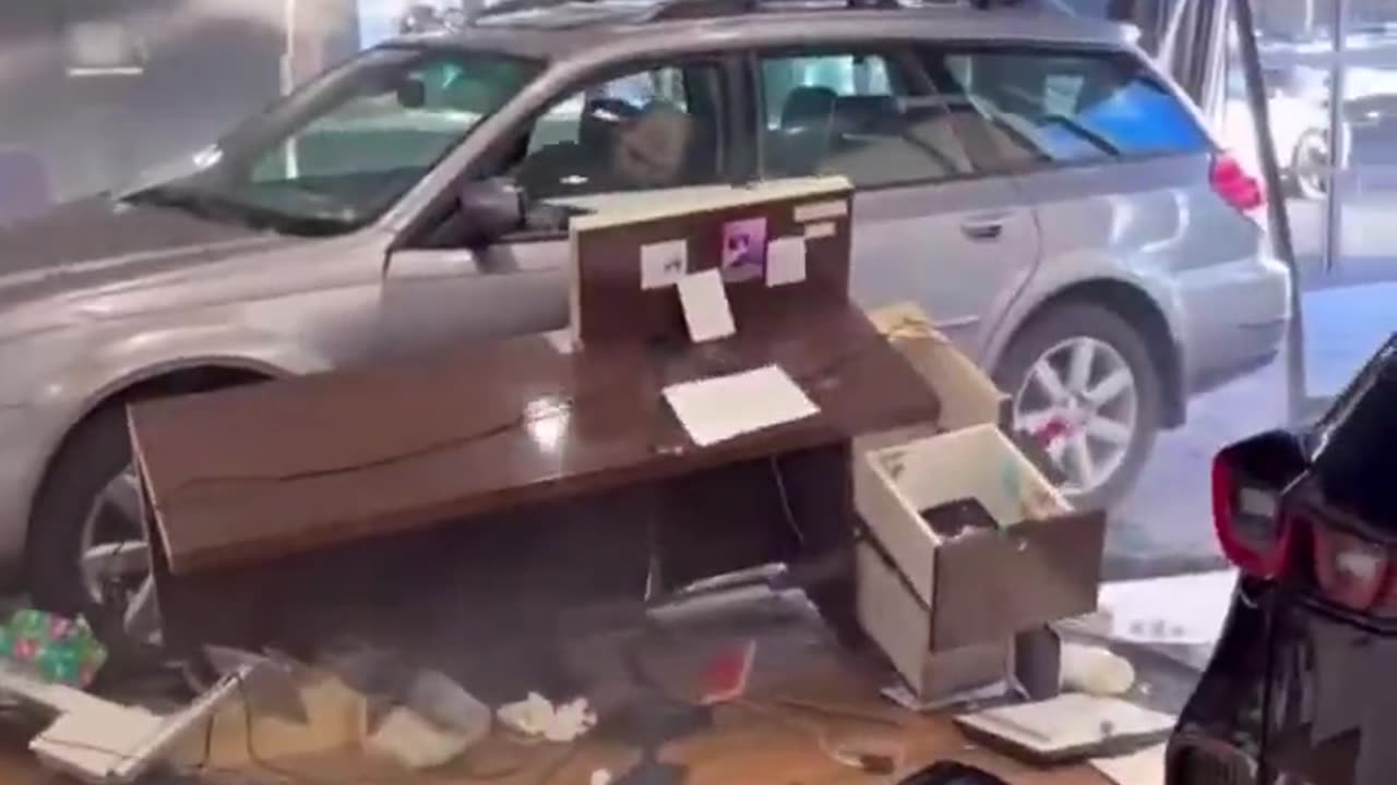 Man crashes car into dealership showroom