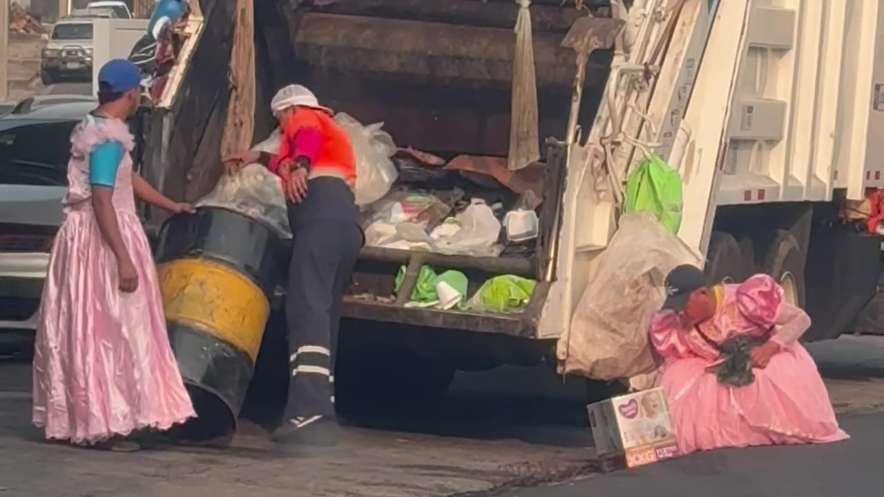 Trash Collectors Rock Pretty Pink Dresses