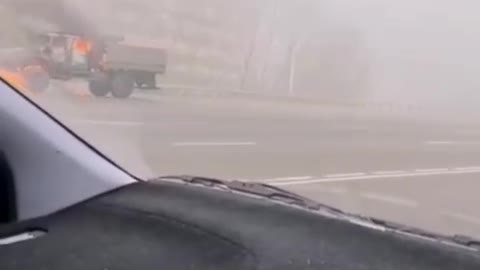 Police and military cars are burning in the streets of Almaty.