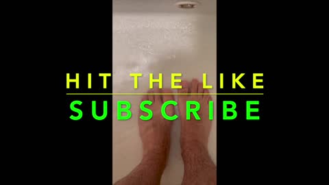 Bare feet in shower. Cleaning