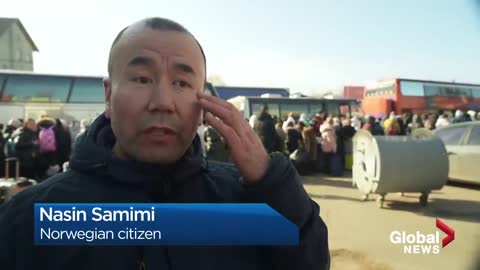 Russia-Ukraine conflict_ Tired, emotional, anxious Ukrainians queue to leave the