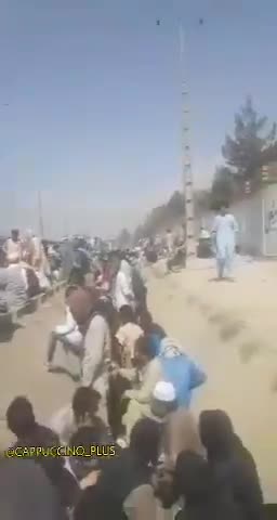 Afghans HIDE in Ditch to Avoid Gunfire Outside Kabul Airport