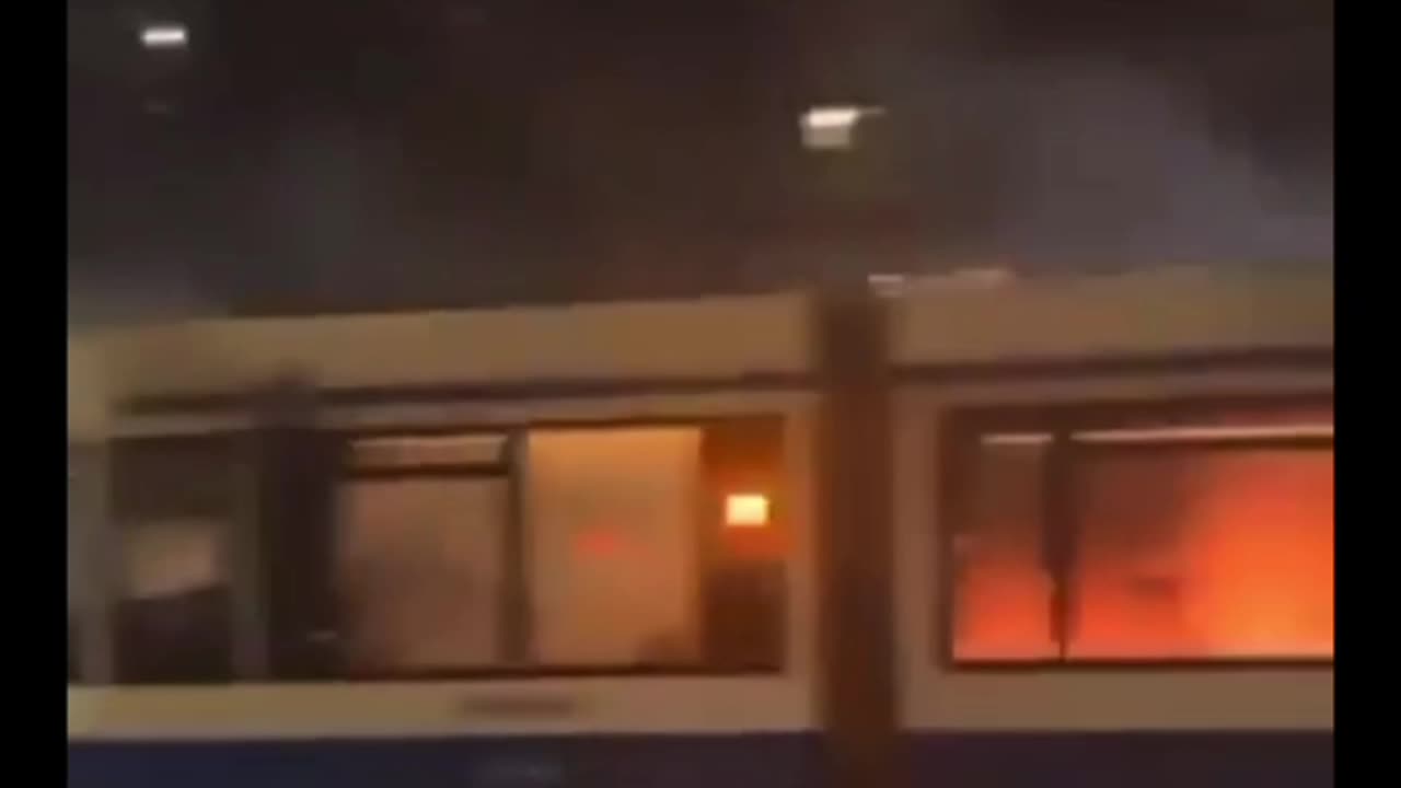 Rioters set a tram on fire in the Dutch city of Amsterdam