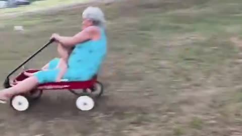 This is the heartwarming moment a grandmother took her grandson to join her on a jolly scooter