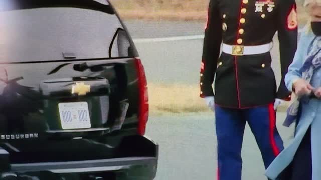 Joe Biden possibly falling behind vehicle....