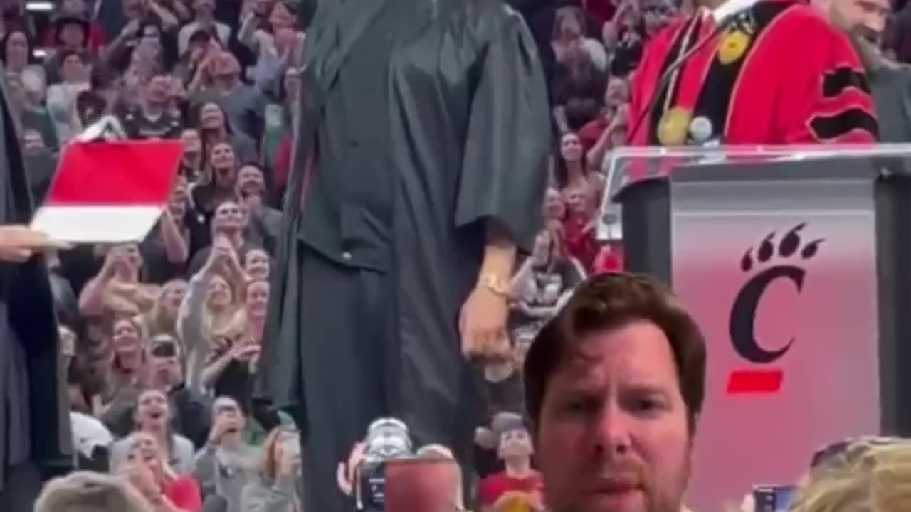 Travis Kelce chugs beer at graduation