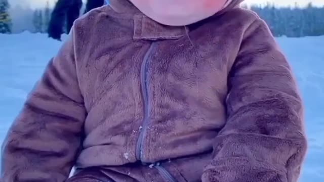 Snowfall with cute baby