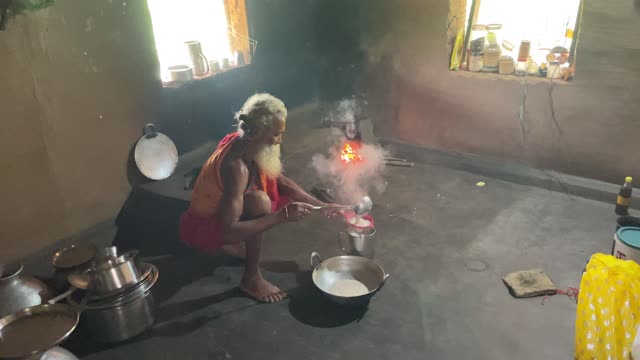 Dayalu Baba Prepares Tea in the Morning