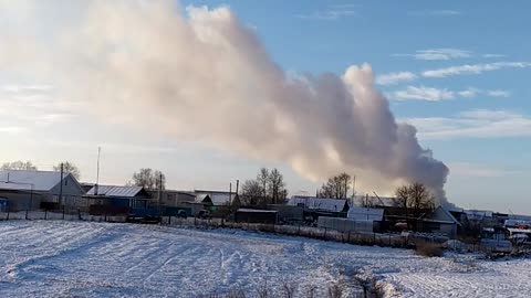 Fire in a village in Russia