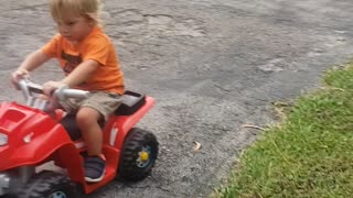 1 year old rides 4 wheeler!!!