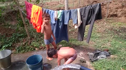 Rural boy enjoyed bathing, kids fun