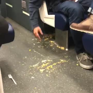 Man drop s chips brushes them under train chiar