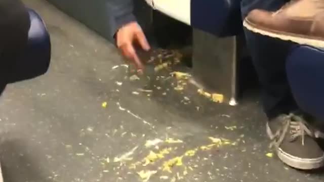 Man drop s chips brushes them under train chiar