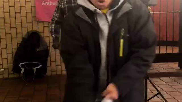 Man black jacket dancing bag in hand