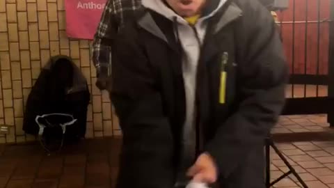 Man black jacket dancing bag in hand