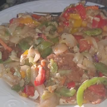 Veggies patties topped with grilled veggies/slaw!