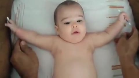 Cute baby does impressive push ups