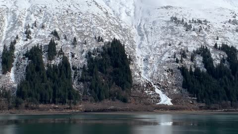 Man Made Avalanche Roars Down Mountainside