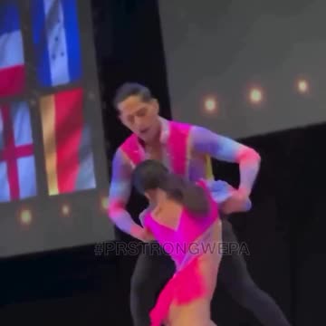 Woman falls in dance contest, keeps smiling