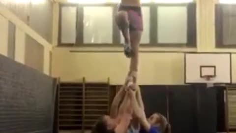 Collab copyright protection - four girls cheer stunt one girl fall