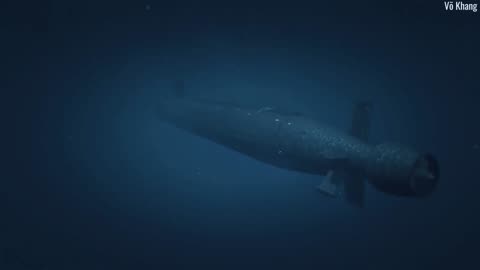 U.S Navy Virginia-class nuclear submarines practice surfacing and diving