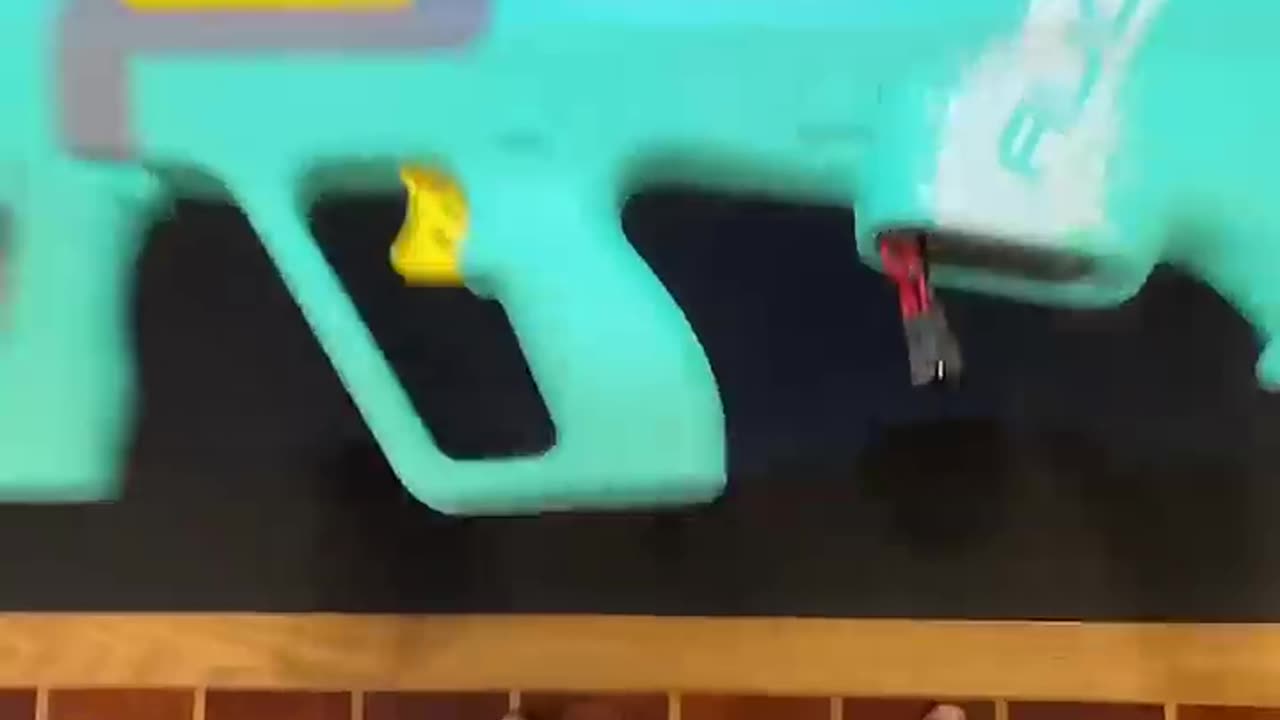 kids shoot water gun