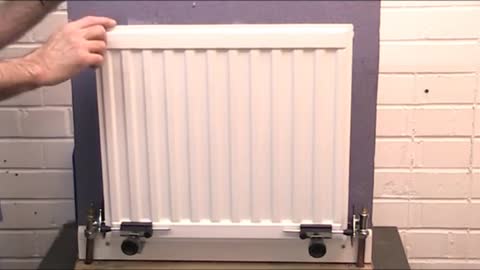 Save money fit reflective foil behind radiator, WITHOUT draining