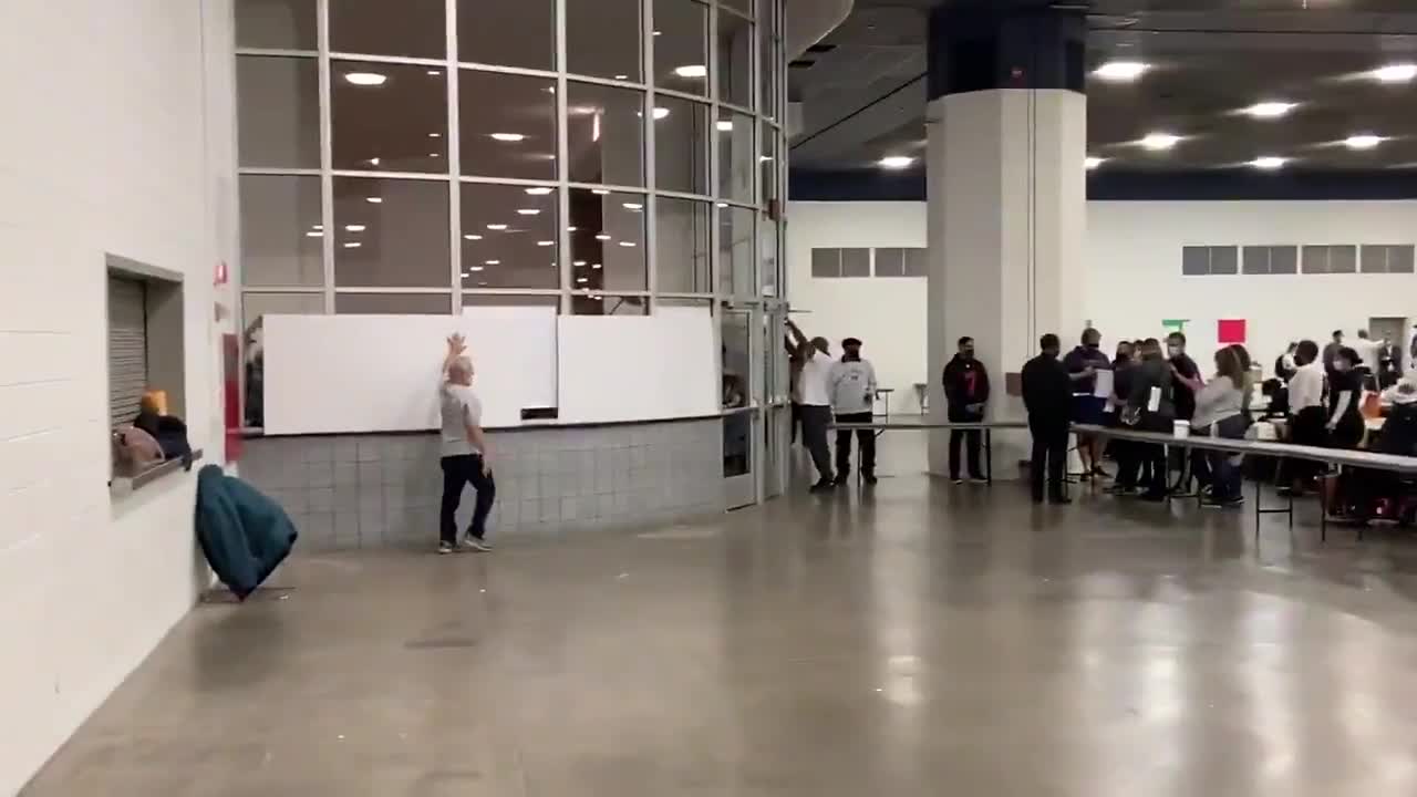 Officials COVER Windows at Detroit's Absentee Ballot Counting Center