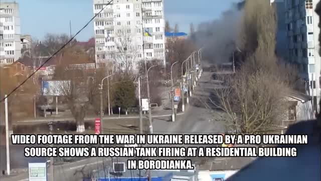 Russian Tank Fires Directly At Residential Building Nearly Hits Person Filming