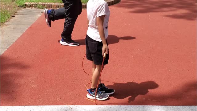 Little kiddo jump rope day at the park