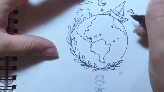 A girl trying to draw the earth