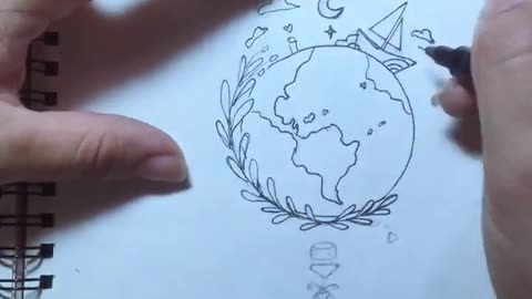 A girl trying to draw the earth