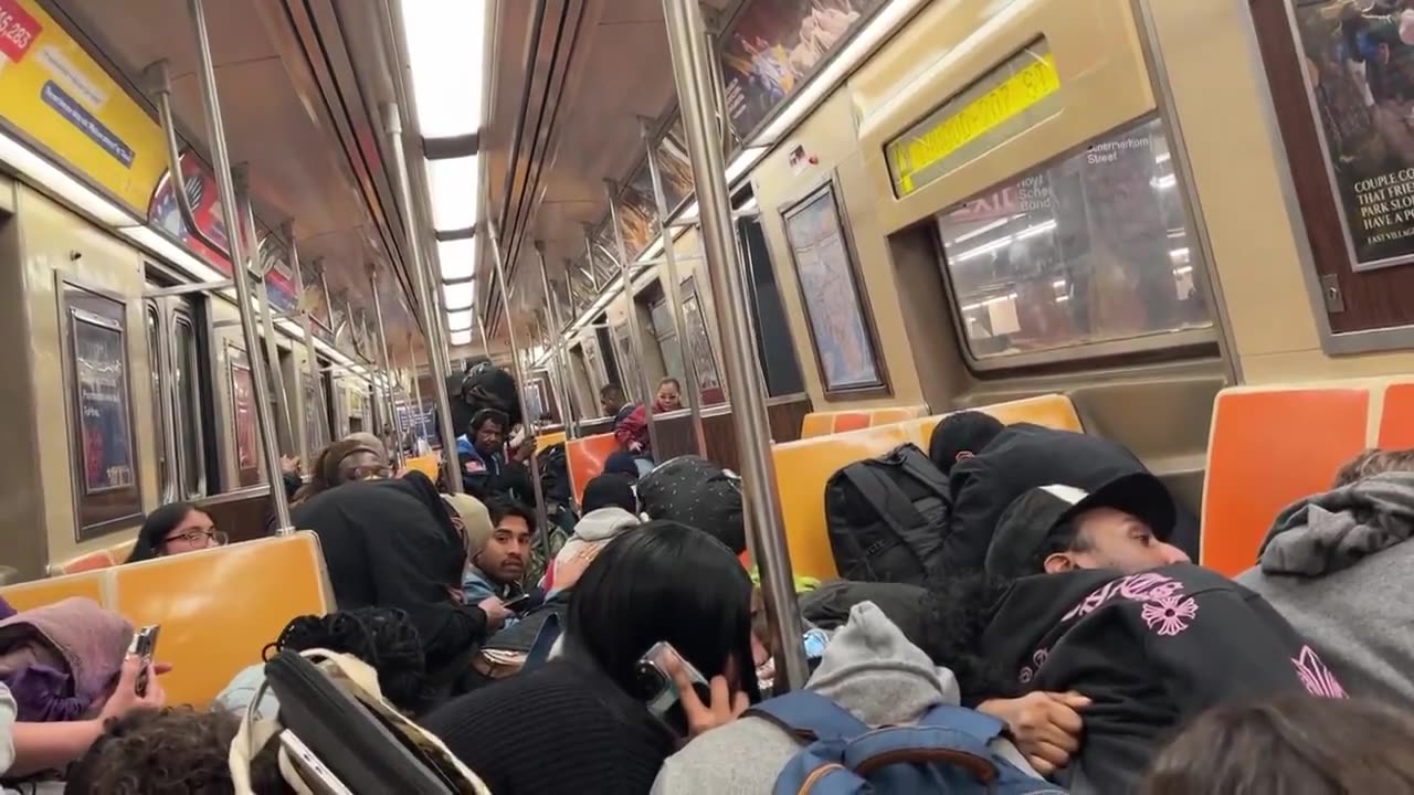 Dramatic Footage from Shooting in Brooklyn Subway Station Shows Commuters Hunkering Down