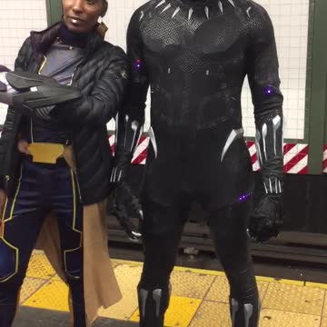 Black panther costume glowing purple lights