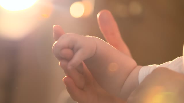 Mother Holding Babys Hand