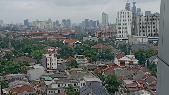 view of the city of jakarta from the top of the building