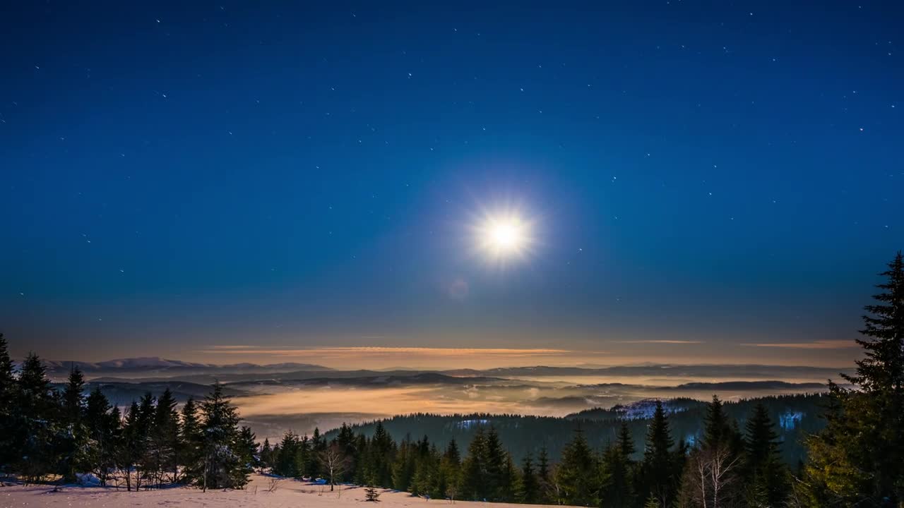 Bright moon in a starry sky in the mountains