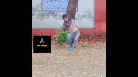 young boy play short very well