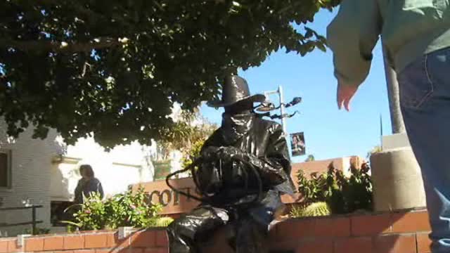 Bronze Cowboy Statue Scares Tourists That Try Posing Next To Him