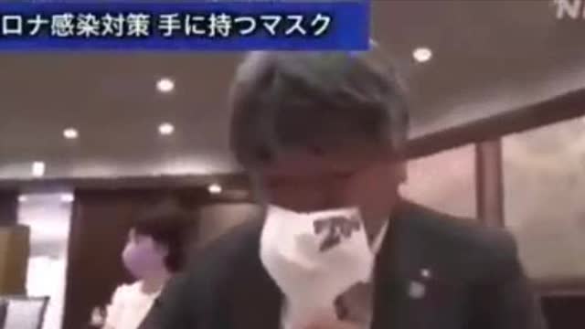 Removing mask to eat!