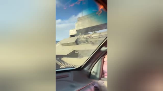 Locals throw Molotov cocktails at Russian tanks. RUSSIA ATTACKS UKRAINE