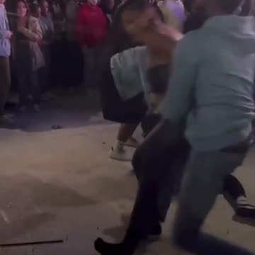 Guy protects his girlfriend from getting jumped at a concert in Houston Texas
